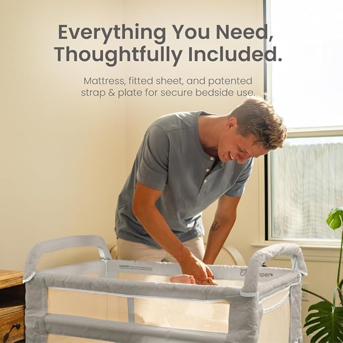 Arm’s Reach Clear-Vue Co-Sleeper Bedside Bassinet Featuring Clear Mesh Panels with Fold-Down Side, Large Attached Storage Basket, 4 Wheels, and Height-Adjustable Legs, Gray