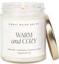 Sweet Water Decor Warm and Cozy Candle - Orange Peel, Cinnamon, Ginger and Clove Soy Winter Scented Candles for Home - 9oz Clear Jar + Gold Lid, 40+ Hour Burn Time, Made in The USA