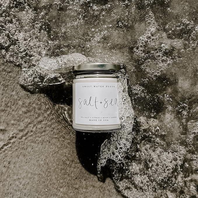 Sweet Water Decor Salt and Sea Candle - Sea Salt, Citrus, Amber, Musk, Beach Scented Soy Candles for Home - Coastal Decor for Beach Lovers - 9oz Clear Jar, 40 Hour Burn Time, Made in The USA